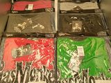 many t - shirts that are sitting on a shelf