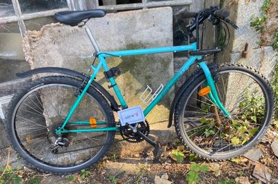 a bike that is parked next to a building