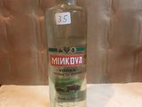 a bottle of vodka that is sitting on a table