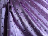 the back of a purple dress with silver sequins on a mannequin mannequin mannequin mannequin mannequin mannequin mann