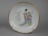 an image of a plate with a woman and a bird on it