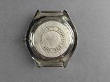 an image of a close up of a wrist watch on a table