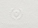 a close up of a white paper with a heart on it
