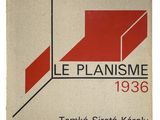 un livre sur lequel figure un logo rouge et noir