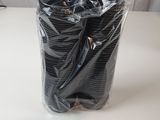 a bag of black wires on a table