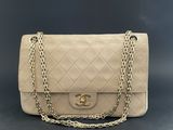 a chanel beige quilted leather shoulder bag with gold chain