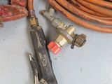 a bunch of hoses that are sitting on the floor
