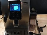 a coffee machine that is sitting on a wooden table