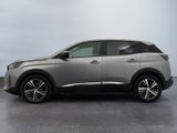 the silver car is parked on the concrete floor in the room