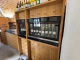 bottles of wine are lined up on the shelves in a wine cellar
