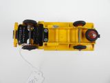 a yellow toy car with black wheels on a white surface