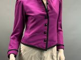 an image of a mannequin wearing a purple jacket and beige pants