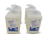 two bottles of hand sanitizer on a white background