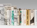 many books that are lined up on a shelf