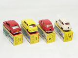 several toy cars are lined up in a row on top of boxes