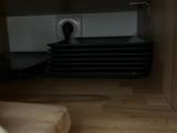 a picture of a person that is hiding in a room