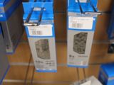 many boxes of electronic devices on display in a store