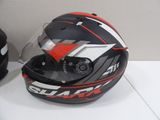 a helmet on the table next to a helmet on the table