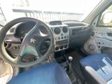 a car with a steering wheel and a dash board in it