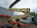 a crane that is sitting in the middle of a parking lot