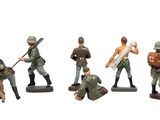 figurines of a group of soldiers with a dog and a rifle