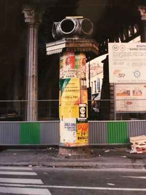 a traffic light that is on the side of the street