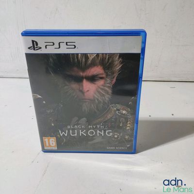un gros plan d'un jeu vidéo posé sur une table, avec un arrière-plan flou