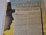 an image of a newspaper with a picture of a man in a hat