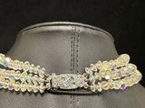 a close up of a necklace on a mannequin mannequin mannequin mannequin mannequin mannequin mannequin mannequin