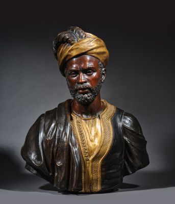 un buste en bronze représentant un homme coiffé d'un turban