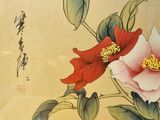 a painting of a bird and flowers on the wall