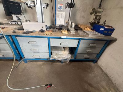a picture of a workbench with a lot of tools on top of it