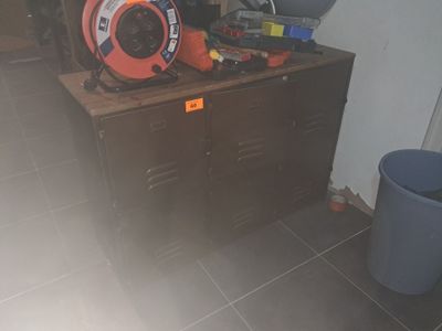 an image of a room with a cabinet and a blower