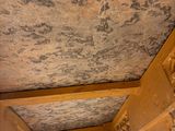a picture of a room that has a ceiling with a pattern on it