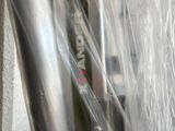 a bike that is wrapped up and ready to be ridden