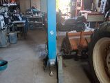 an image of a large tractor in a garage