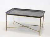 an image of a black and gold tray on a gold stand