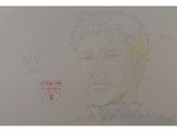 drawing of a man ' s face on a piece of paper