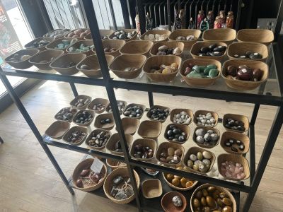 a lot of bowls and bowls that are on a shelf