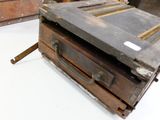 an old suitcase sitting on top of a white table