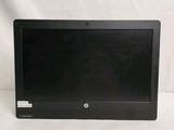 laptop with black screen sitting on a white surface with a white background