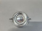 an image of a silver object on a white surface