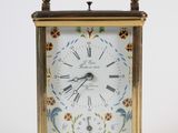 a small clock that is sitting on a table