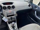 a dashboard of a car with a radio and a steering wheel