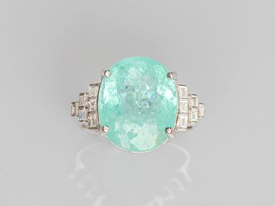 an emerald and diamond ring
