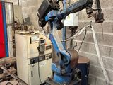 a robot that is sitting on a table in a room
