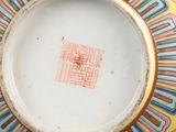 a plate with a design on it on a table