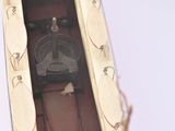 a clock that is on the side of a building