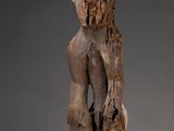 an image of a sculpture of a man holding a piece of wood