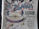 un vieux livre sur lequel est dessiné un tambour